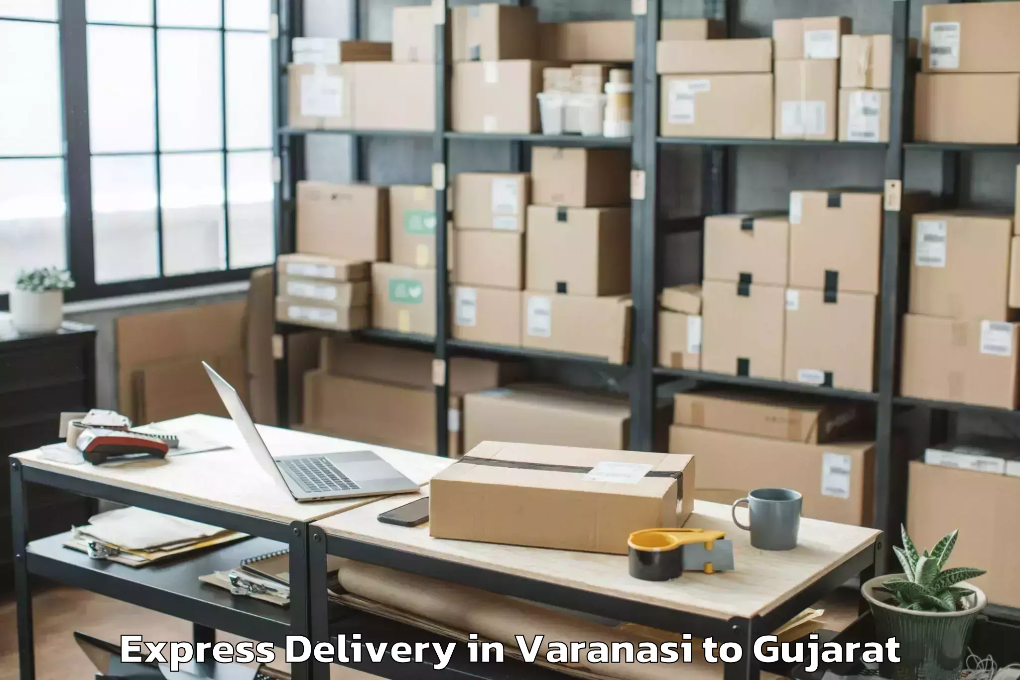 Discover Varanasi to Madhavpur Express Delivery